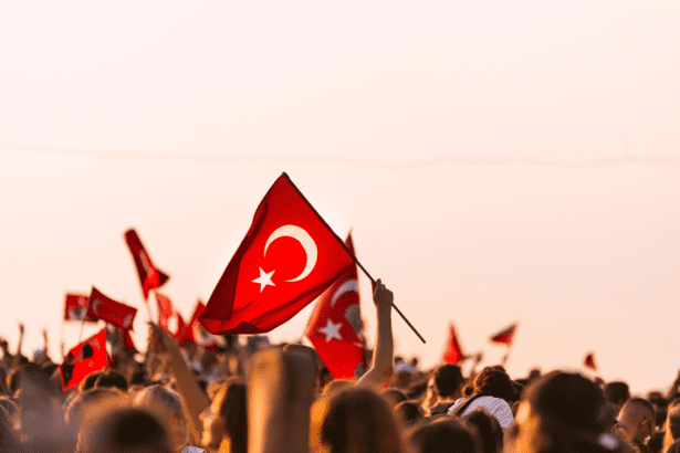 Crowd waving Turkish flags
