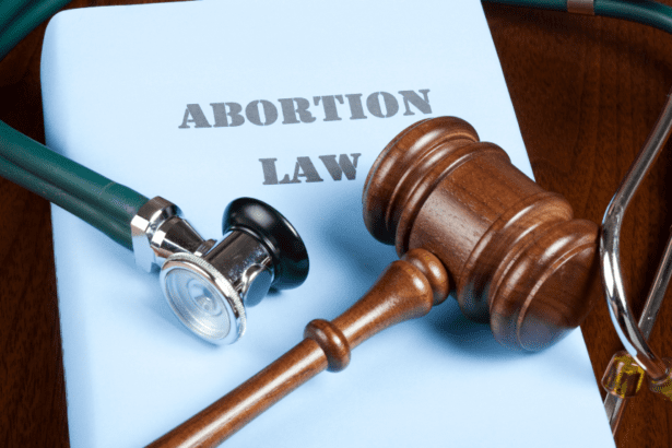 Abortion law document with gavel and stethoscope