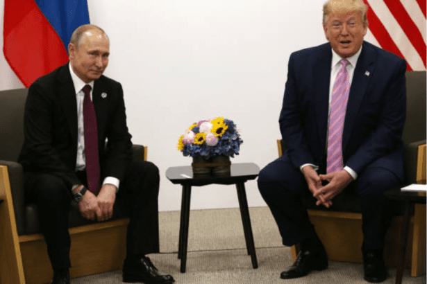 Vladimir Putin and Donald Trump meeting with flags in background