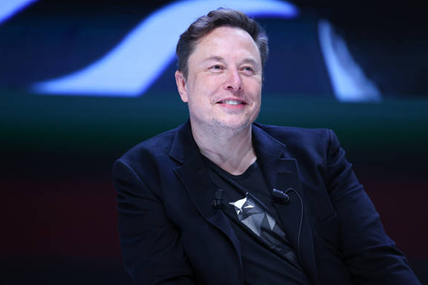 Elon Musk speaking at event