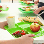 School meal trays being served