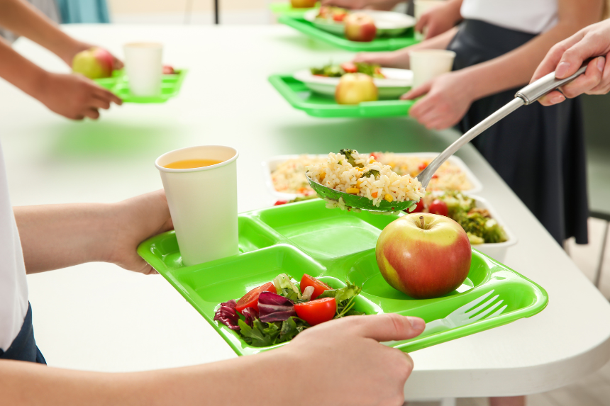 School meal trays being served