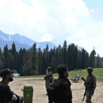 Soldiers in Kashmir landscape
