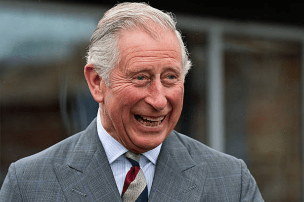 King Charles III smiling