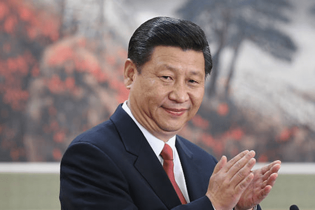 Xi Jinping applauding
