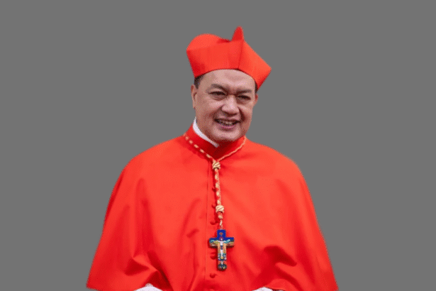 Cardinal aiding poor