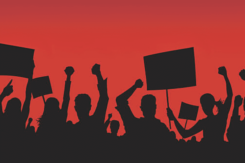 Women protest with brooms