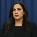 Alina Habba speaking at a press conference after announcing her resignation